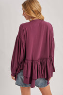 RUFFLED PEPLUM HEM OVERSIZED KNIT TOP
