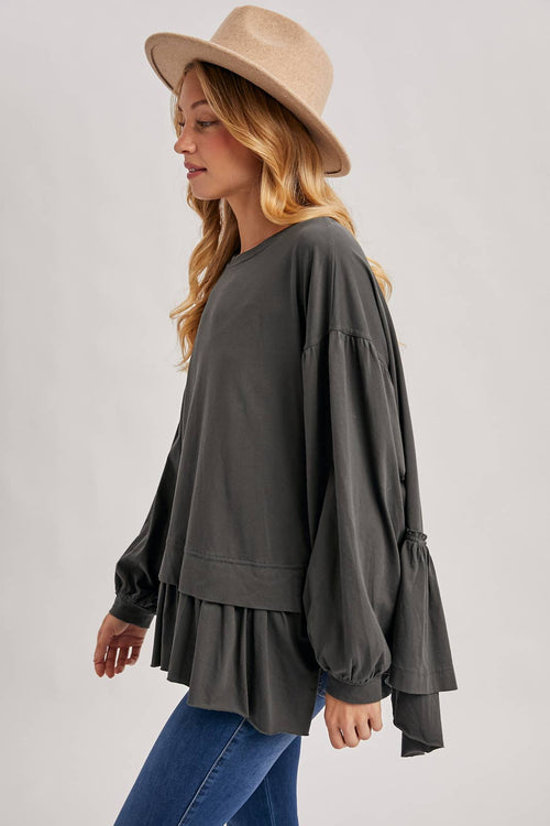 RUFFLED PEPLUM HEM OVERSIZED KNIT TOP