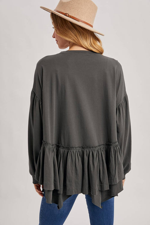 RUFFLED PEPLUM HEM OVERSIZED KNIT TOP