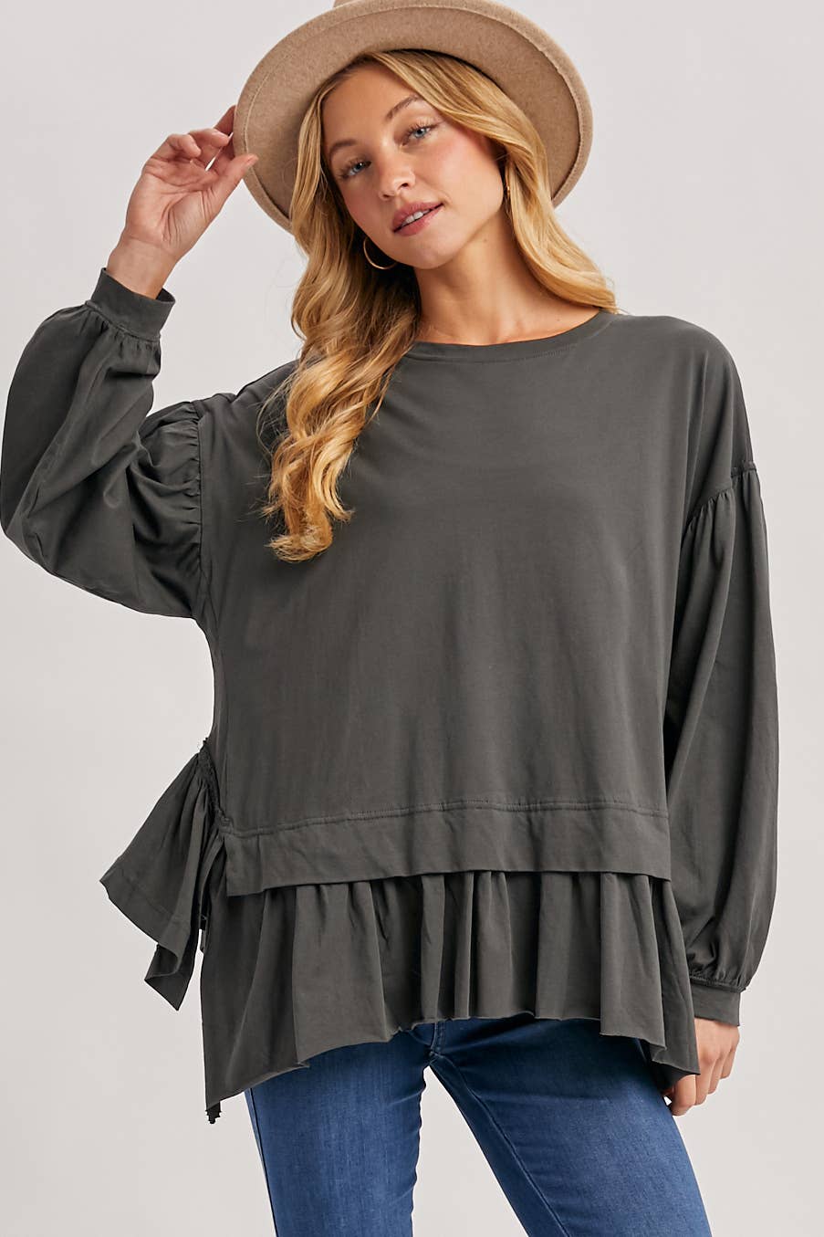 RUFFLED PEPLUM HEM OVERSIZED KNIT TOP