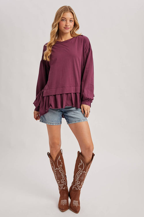 RUFFLED PEPLUM HEM OVERSIZED KNIT TOP
