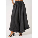 WASHED CHAMBRAY RUFFLE HEM WIDE LEG PANTS