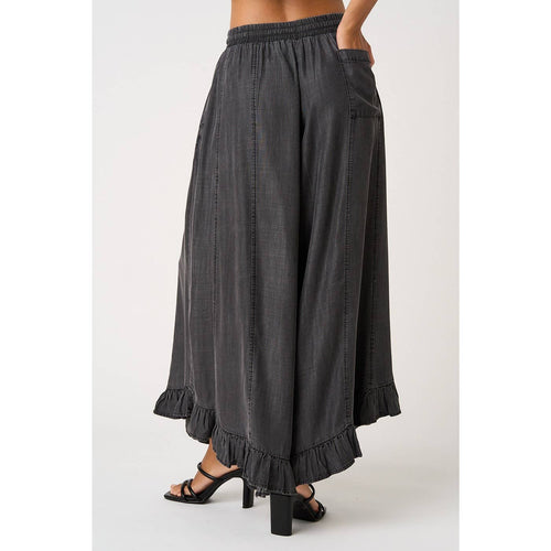 WASHED CHAMBRAY RUFFLE HEM WIDE LEG PANTS