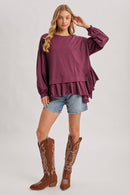 RUFFLED PEPLUM HEM OVERSIZED KNIT TOP