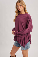 RUFFLED PEPLUM HEM OVERSIZED KNIT TOP