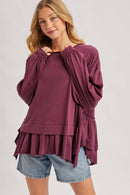 RUFFLED PEPLUM HEM OVERSIZED KNIT TOP